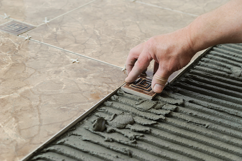 laying tile